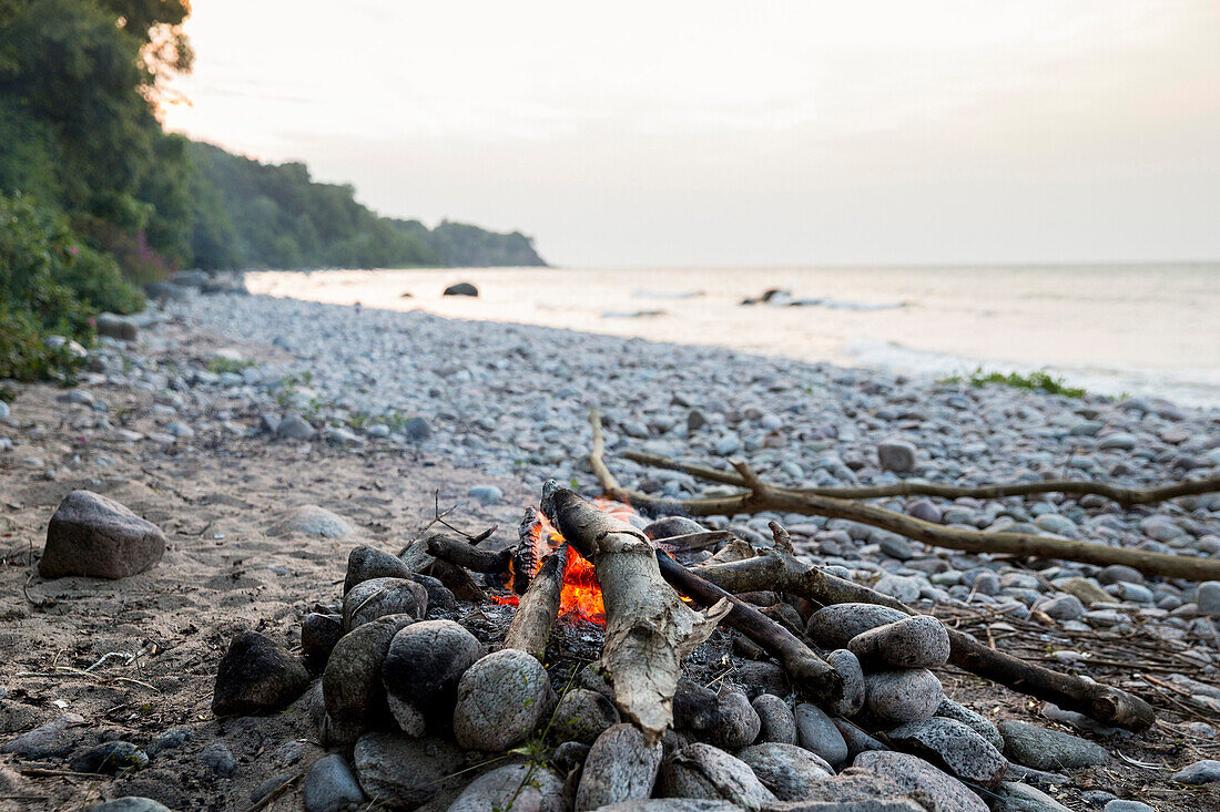 Campfire on the beach, adventure, outdoor, holiday, Baltic sea, Bornholm, near Gudhjem, Denmark, Europe