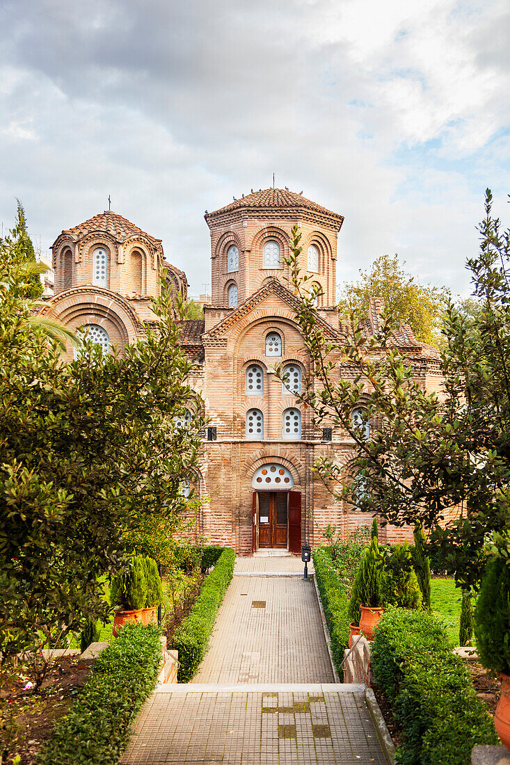 A church building with door open and gardens, Thessaloniki, Greece