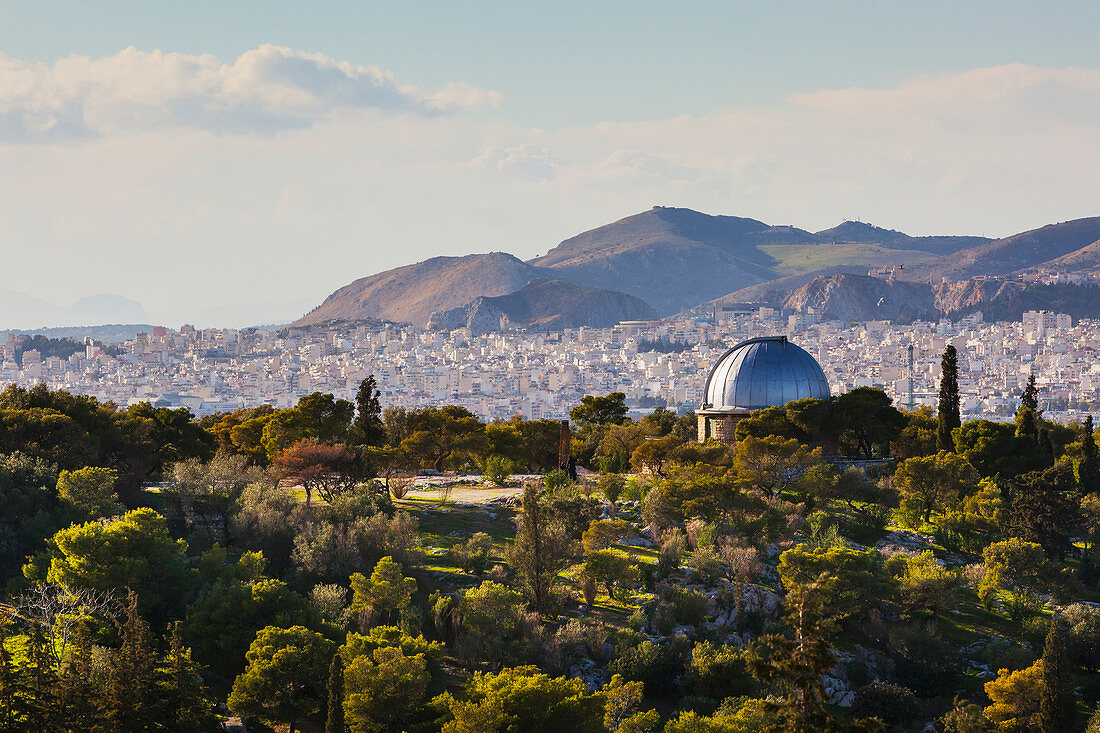 Dome roof and cityscape with mountains in the distance, Athens, Greece