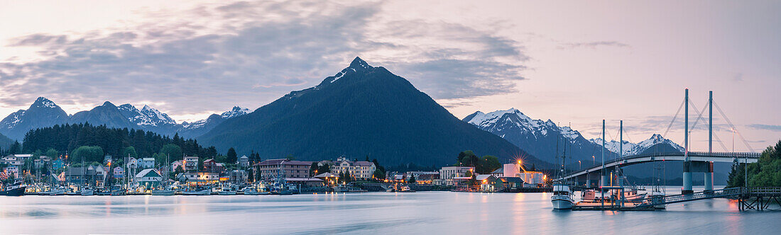 Downtown Sitka and the O'Connell bridge at sunset with the Sisters Mountains in the background, Southeast Alaska, USA, Summer