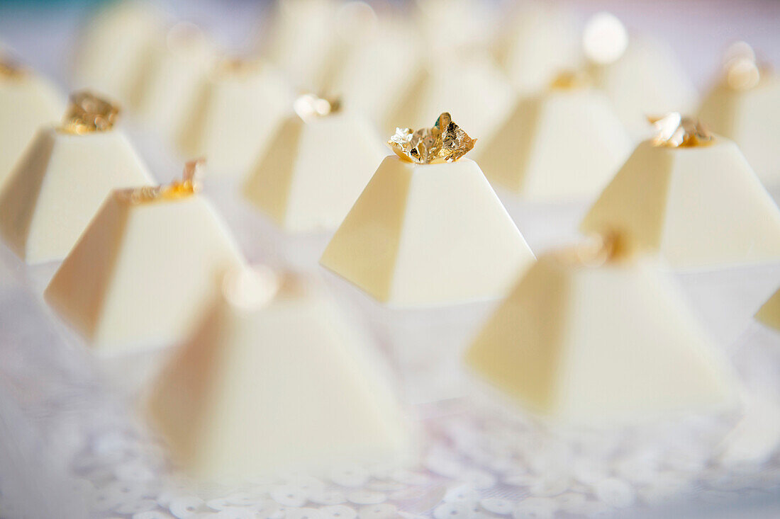 White chocolate pyramids with gold flakes on top, Toronto, Ontario, Canada
