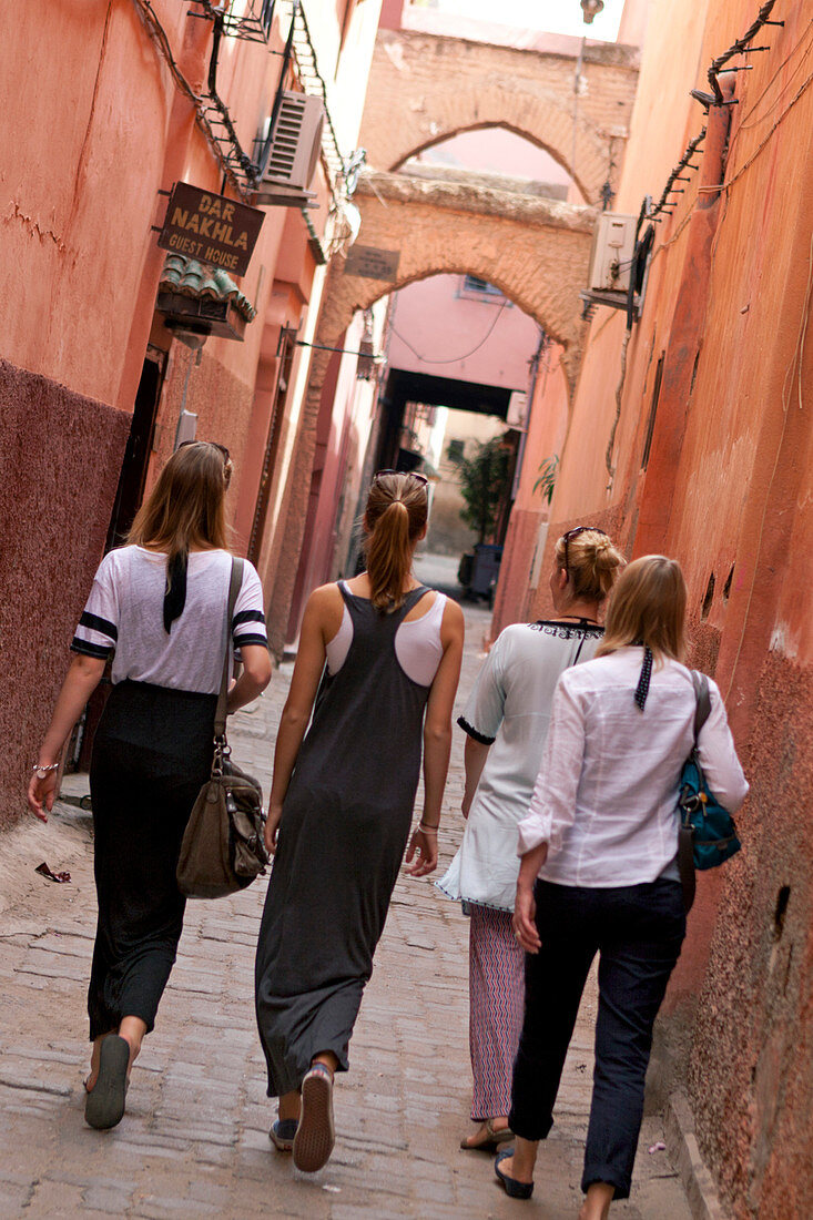 Tourists in the alleys of the Medina, Marrakech, Morocco