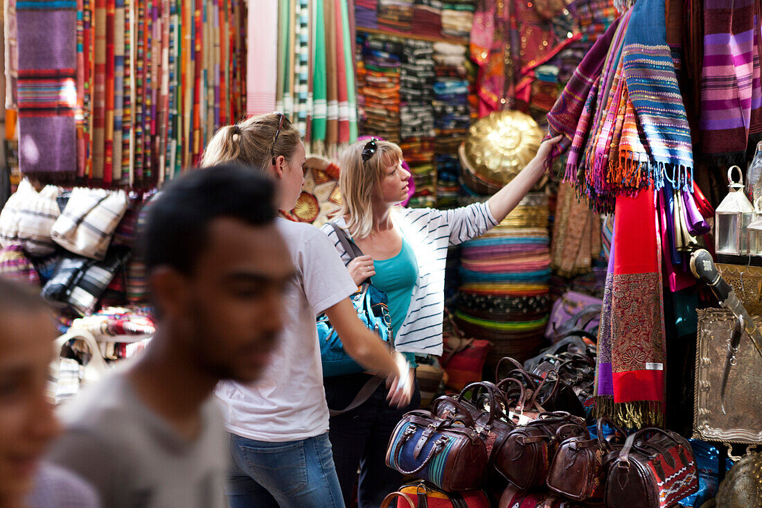 Tourists in the souks, Marrakech, Morocco