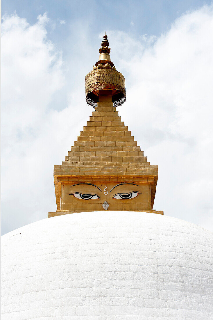 Buddha's eyes on stupa in the grounds of Khamsum Yulley Namgyal, consecrated in 1999, Punakha, Western Bhutan, Asia