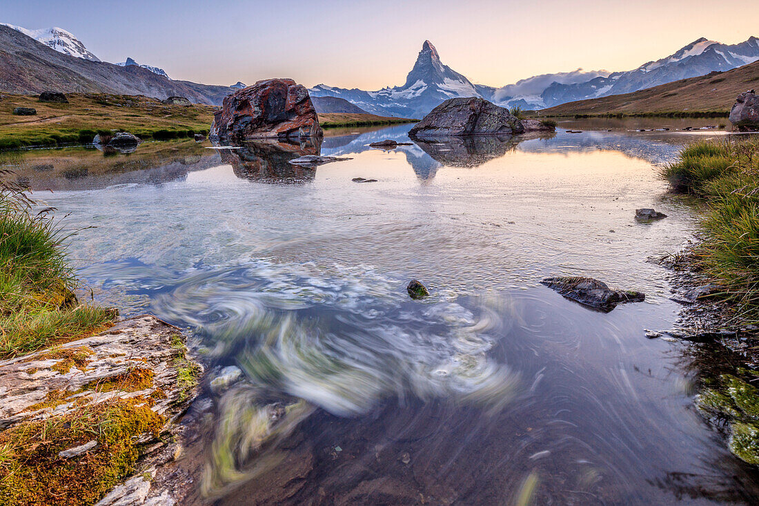 The Matterhorn reflected in Lake Stellisee at dawn, Zermatt, Canton of Valais, Pennine Alps, Swiss Alps, Switzerland, Europe