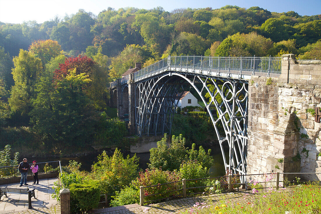 Worlds first iron bridge spans the banks of the River Severn in autumn sunshine, Ironbridge, UNESCO World Heritage Site, Shropshire, England, United Kingdom, Europe