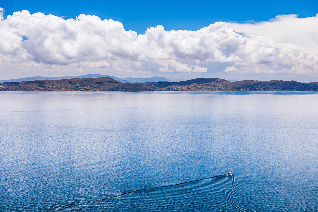 Boat tour on Lake Titicaca, seen from Taquile Island, Peru, South America