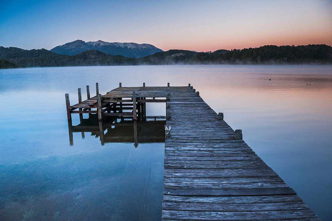 Pier on Lake Nahuel Huapi during a misty sunrise, Villa la Angostura, Neuquen, Patagonia, Argentina, South America