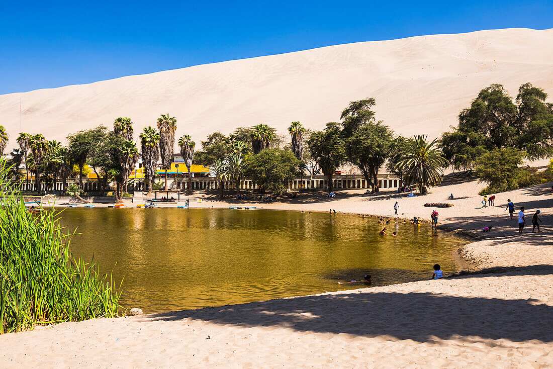 Huacachina, a sand dunes surrounded oasis village in the Ica Region of Peru, South America