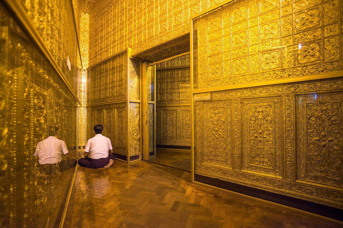 Man praying at Botataung Pagoda, Yangon Rangoon, Myanmar Burma, Asia