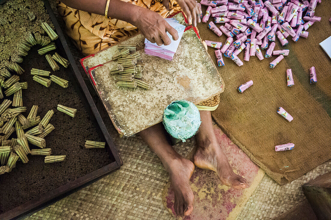 Women working in a cigarette bidi or biri factory near Kannur, Kerala, India.