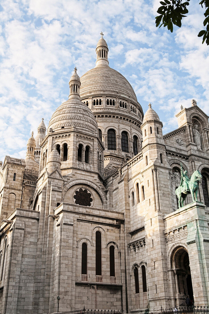 Low angle view of ornate church and dome, Paris, Ile-de-France, France