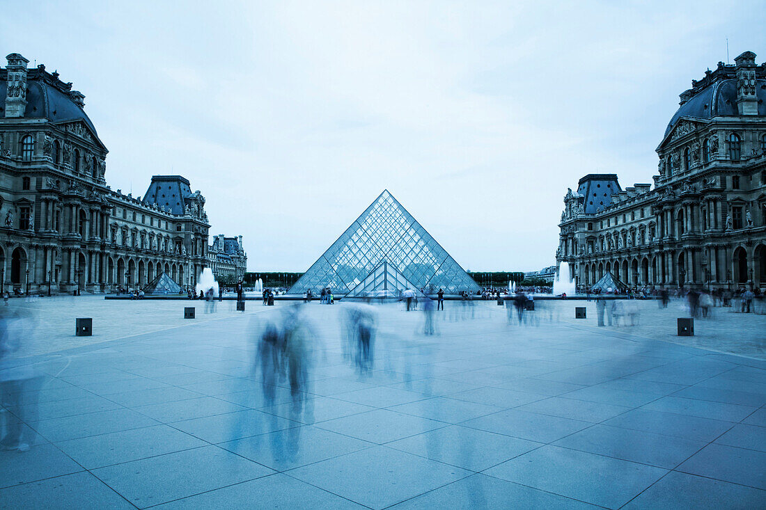 Blurred view of people outside Louvre museum, Paris, Ile-de-France, France