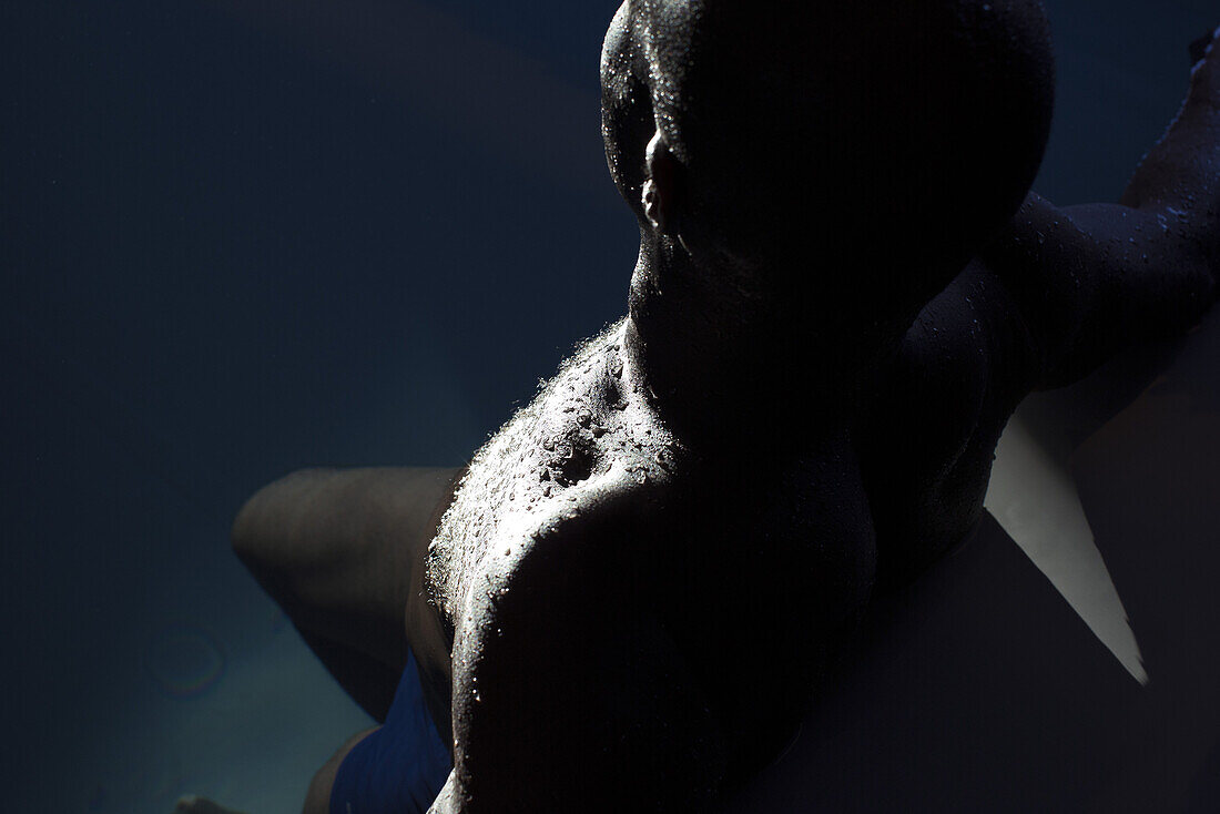 Man relaxing in pool