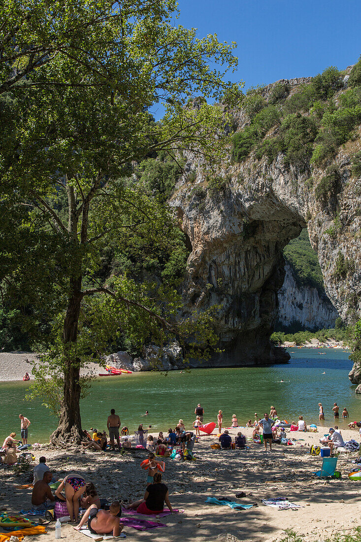 beach on the river in front of the pont d'arc, gorges of the ardeche, vallon-pont-d'arc, nature reserve of the gorges of the ardeche, ardeche (07), france