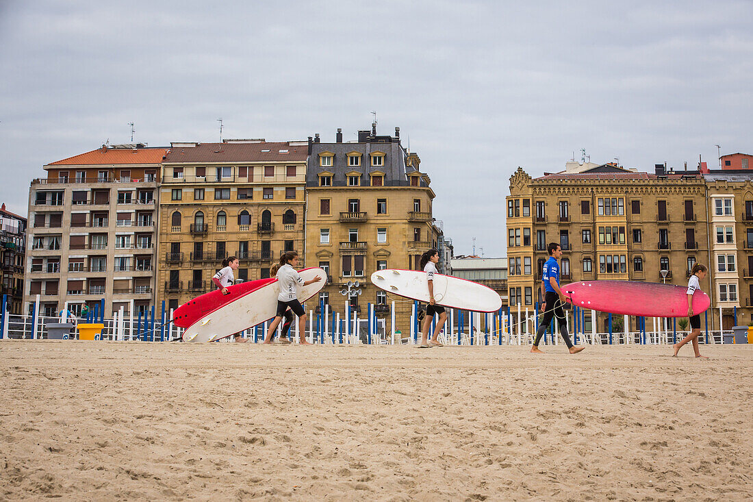 surfing class, zurriola beach, san sebastian, donostia, basque country, spain