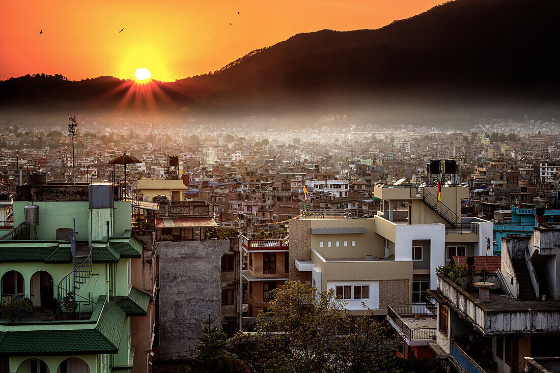 sunset over the city of kathmandu shortly after the major earthquake in 2015, kathmandu, nepal