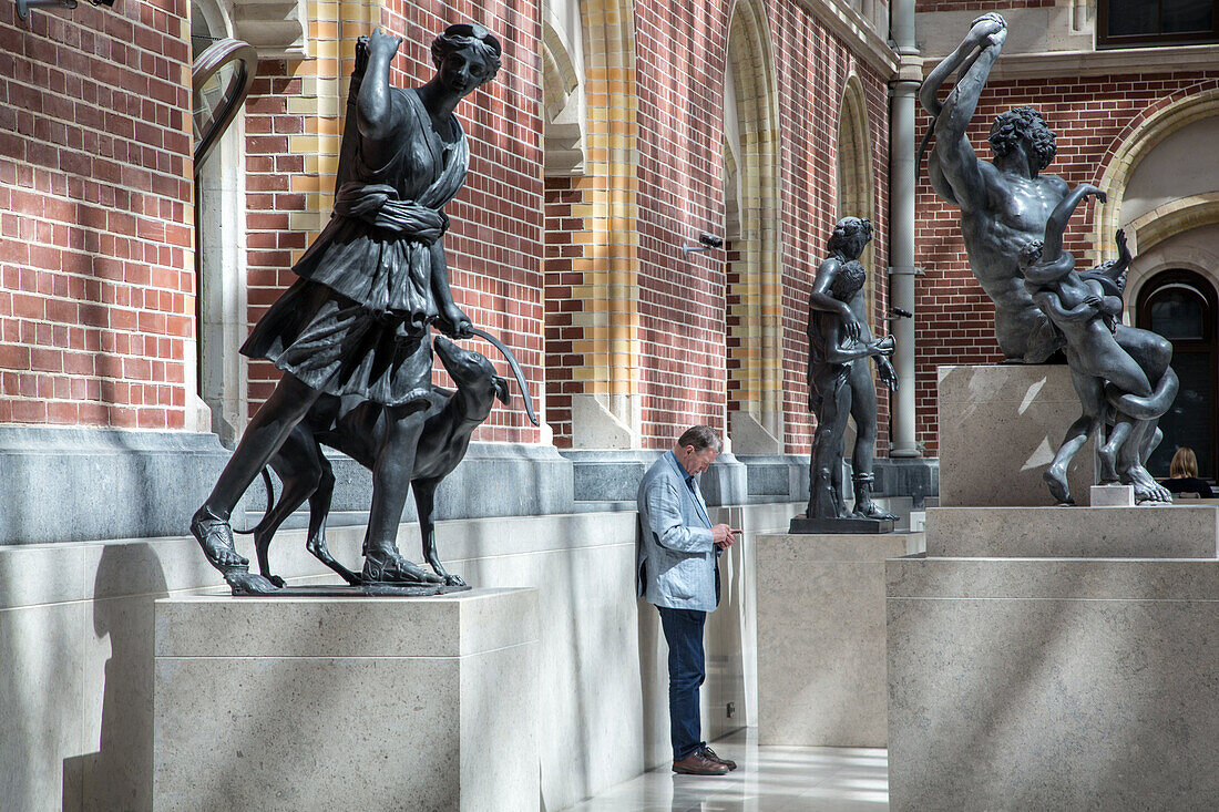 statues in the entrance hall, rijksmuseum, amsterdam, holland