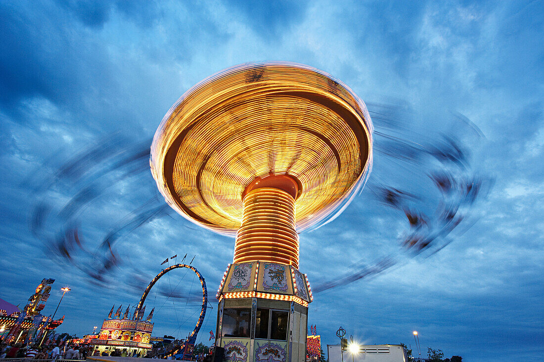 Blurred view of ride at amusement park