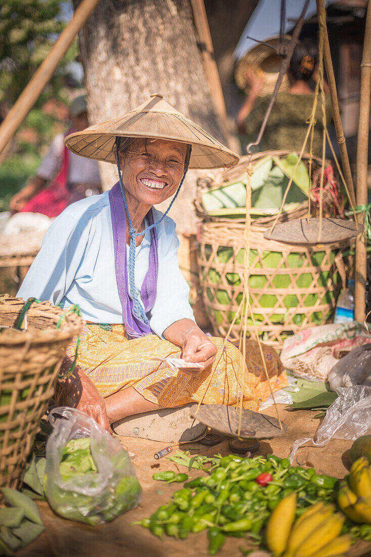 Portrait of a vendor at Ywama Village Market, Inle Lake, Shan State, Myanmar Burma, Asia