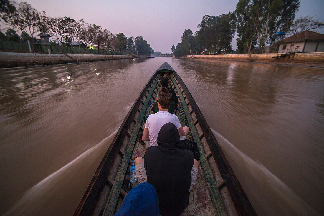 Tourists on a boat on Inle Lake, Nyaungshwe, Shan State, Myanmar Burma, Asia