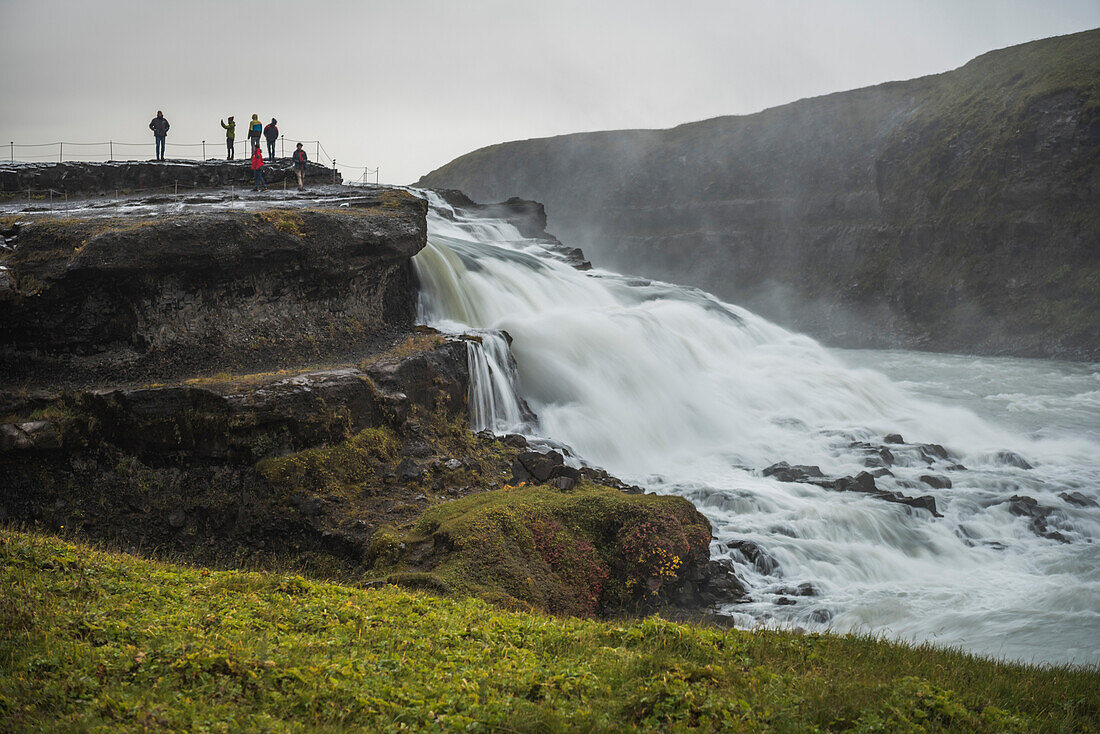 Tourists at Gullfoss Waterfall in the canyon of the Hvita River, The Golden Circle, Iceland, Polar Regions