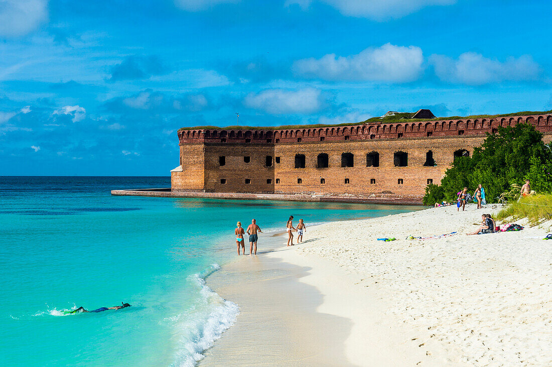 White sand beach and turquoise waters in front of Fort Jefferson, Dry Tortugas National Park, Florida Keys, Florida, United States of America, North America