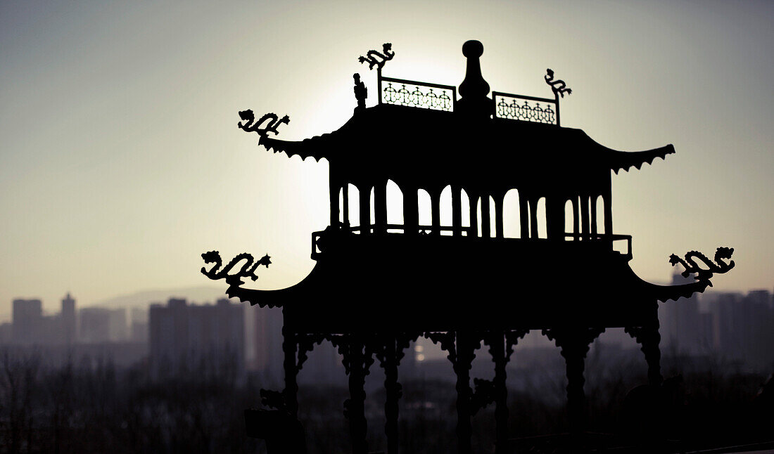Silhouette structure at Ta'er Monastery during sunset, Xining, Qinghai Province, China