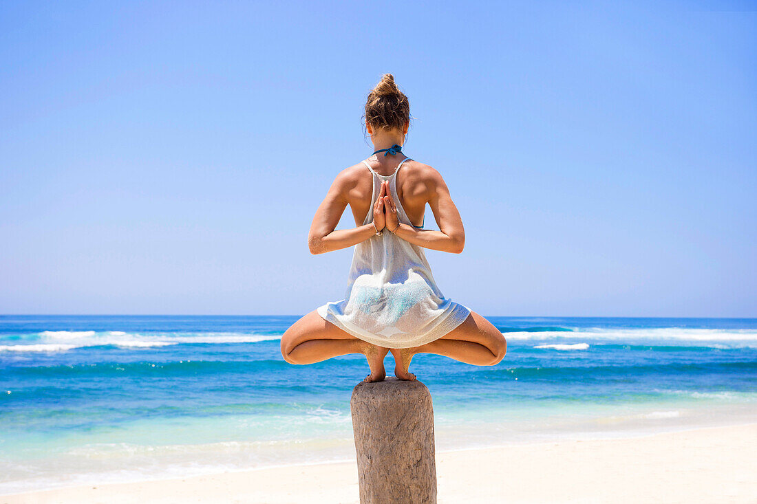 Yoga on a beach.