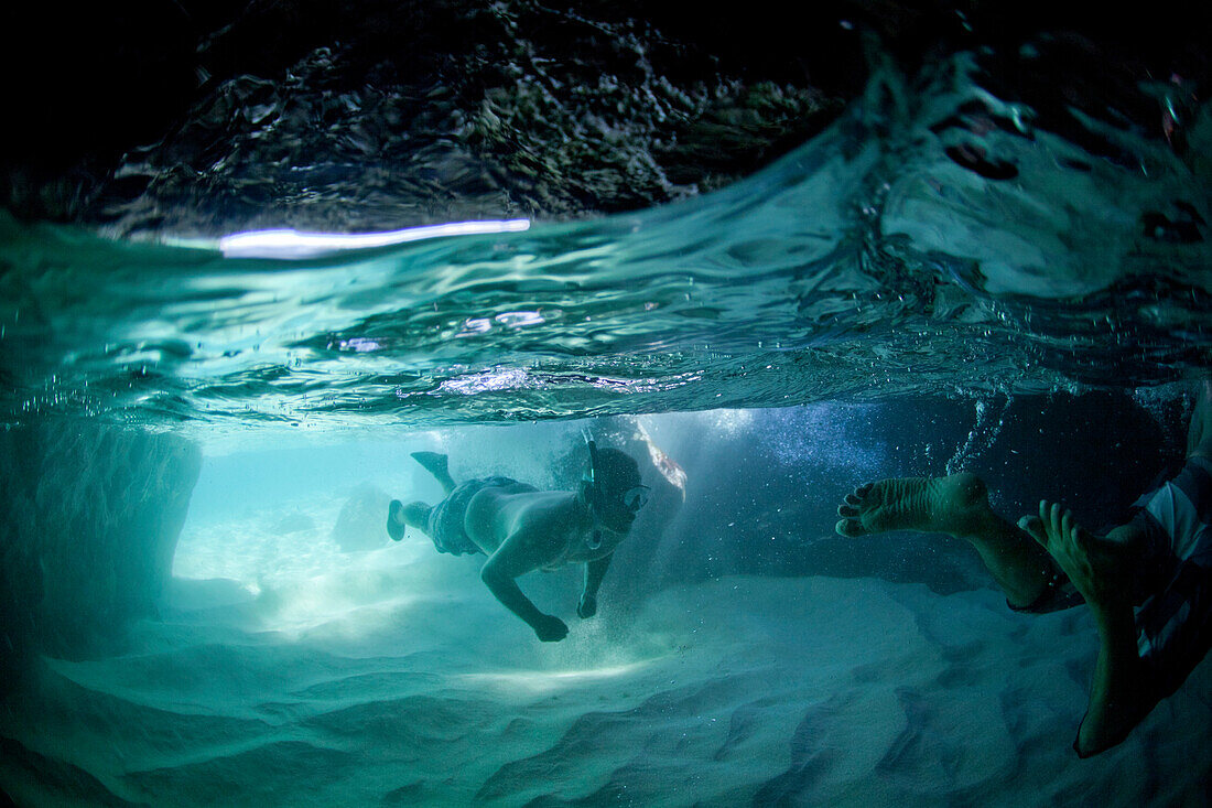 under water at waimea Bay on Oahu's north shore.