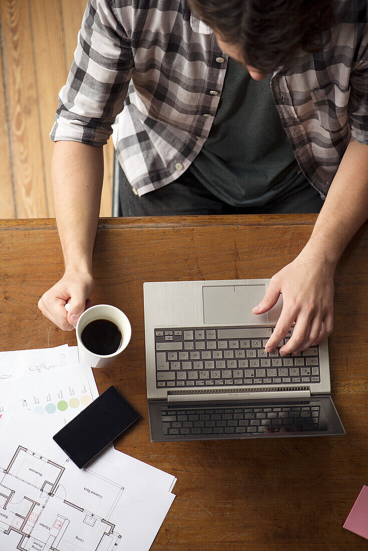 Man using laptop computer