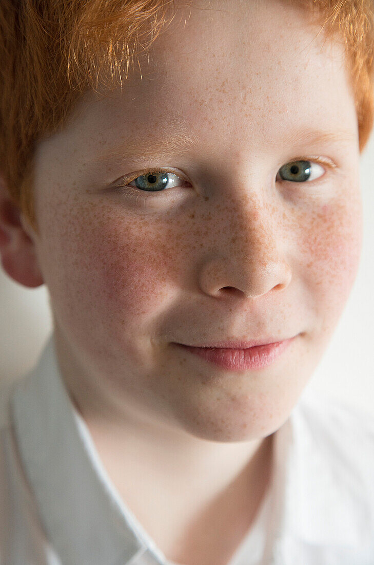 Boy with red hair and freckles, portrait