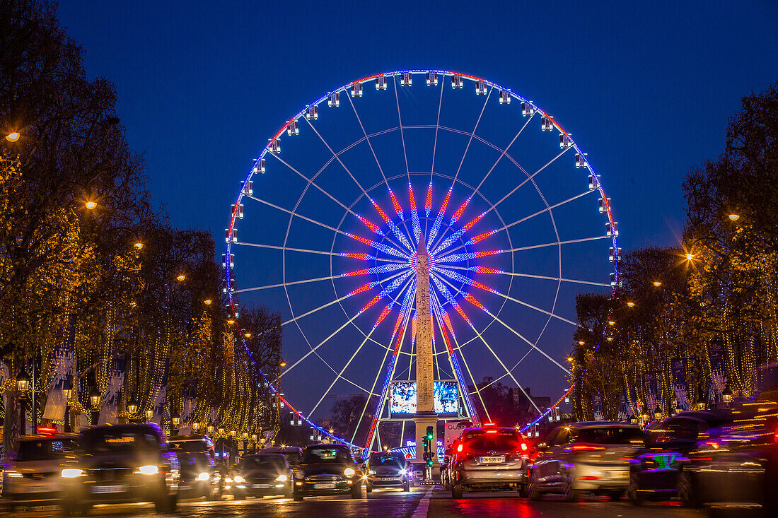 ferris wheel on the place de la concorde and christmas decorations, avenue des champs elysees, paris (75), france