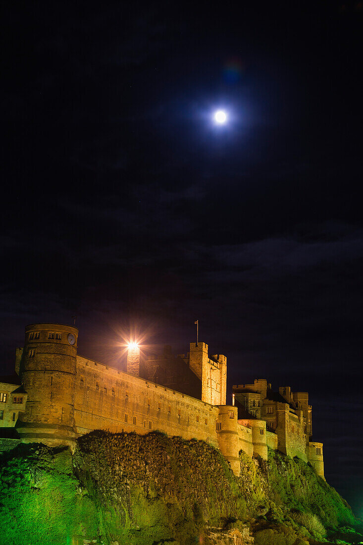 Bright moonlight over Bamburgh Castle Bamburgh, Northumberland, England