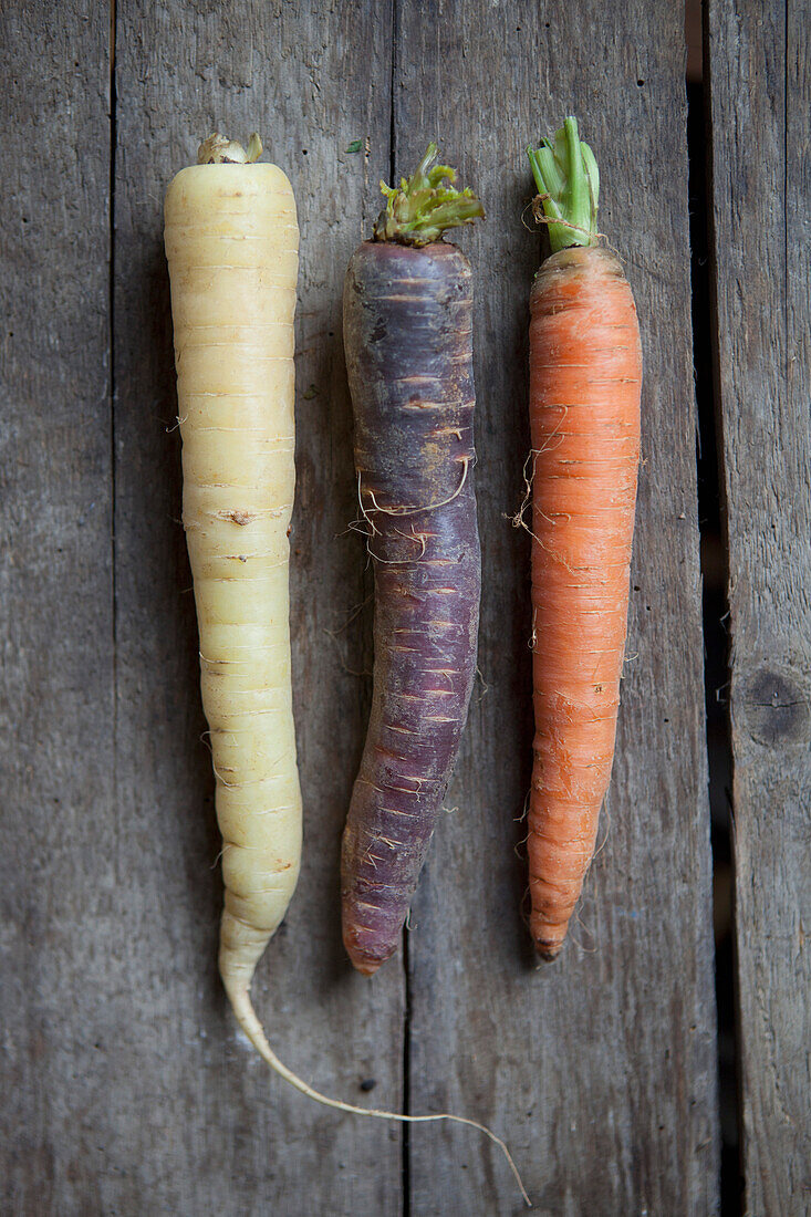 Close-up of radish and  carrots on table