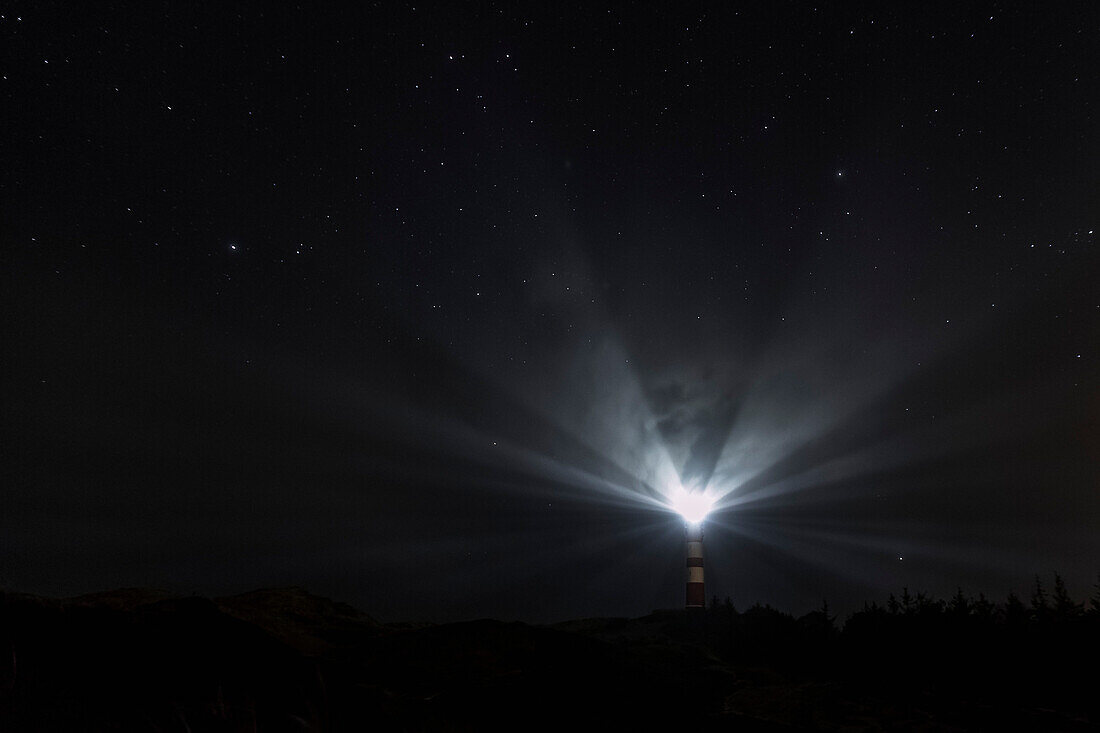 Lighthouse signaling at night