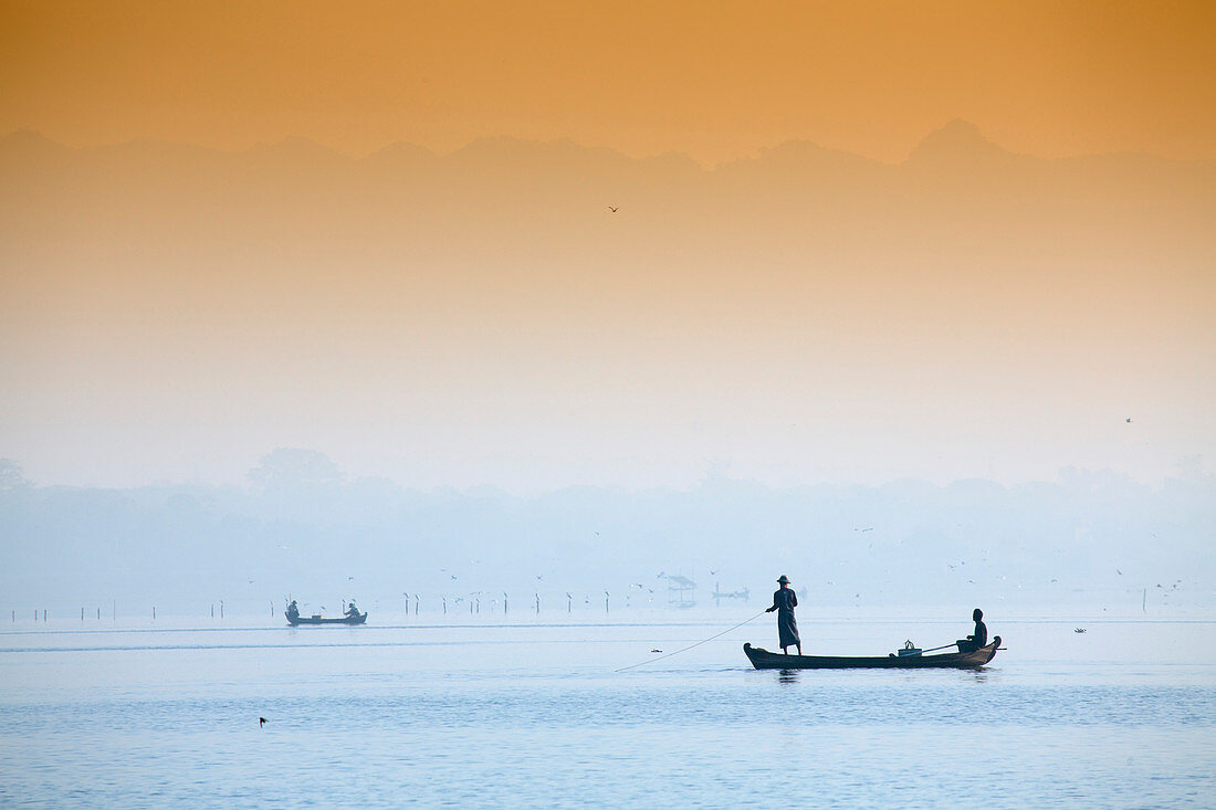 Fishermen on Taungthaman Lake near Amarapura, Mandalay, Myanmar Burma, Southeast Asia