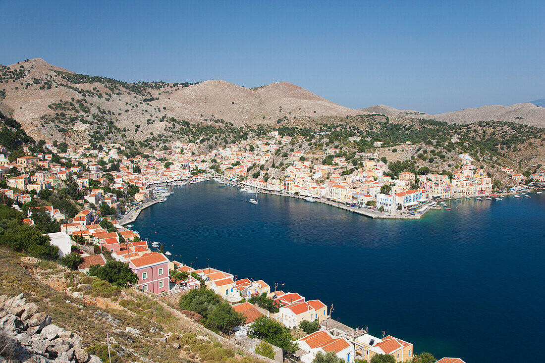 View over the harbour from hillside, Gialos Yialos, Symi Simi, Rhodes, Dodecanese Islands, South Aegean, Greece, Europe