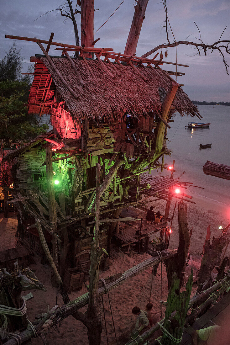 Evening lighting of the so called Hippie Bar in the shape of a pirate ship in Buffalo Bay Ao Khao Kwai, Ko Phayam, Andaman coast, Thailand, Southeast Asia
