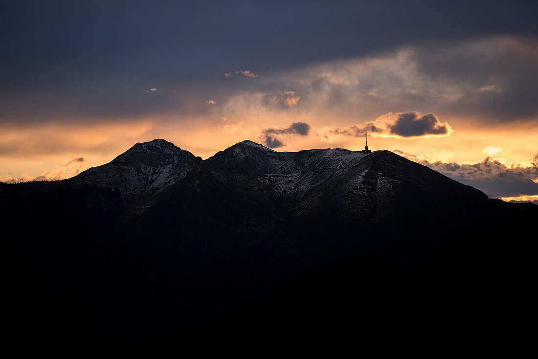 Sunset behind Monte Tamaro and Motto Rotondo, Lepontine Alps, canton of Ticino, Switzerland