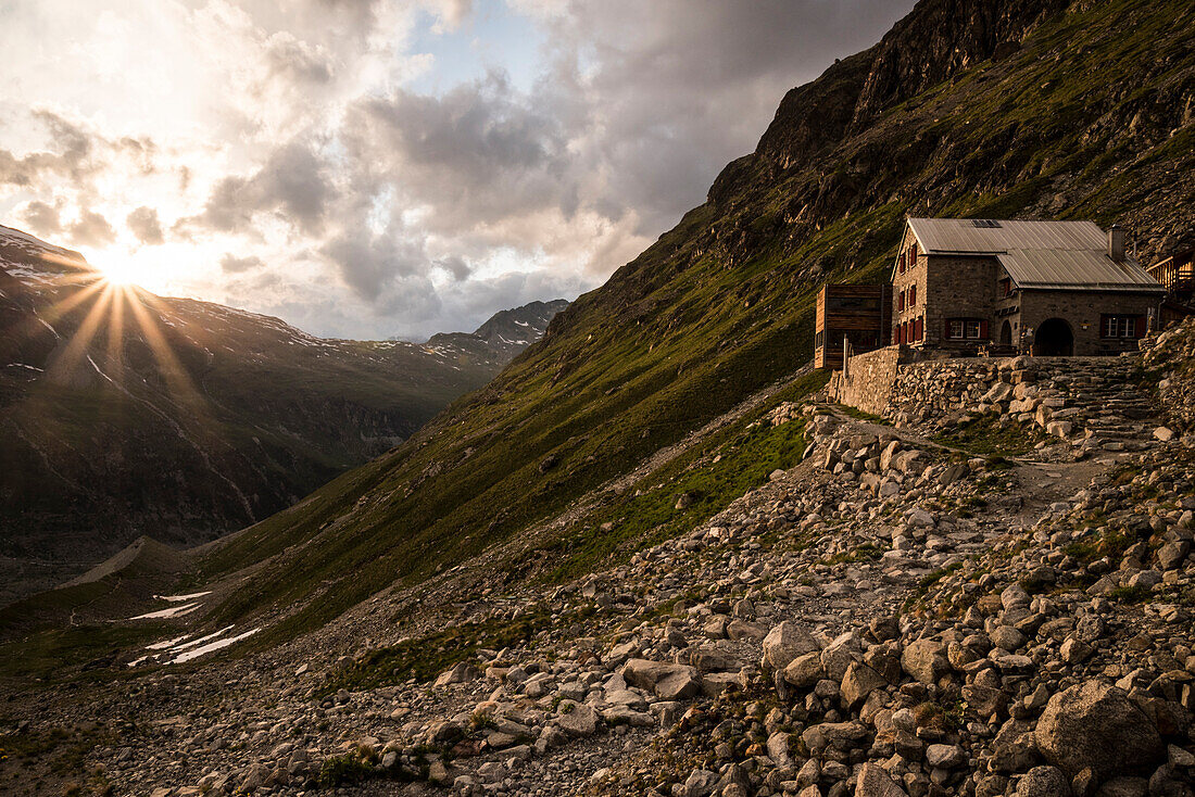 The Tschierva Hut of the Swiss Alpine Club on the base of Piz Bernina at sunset, Rhaetian Alps, canton of Grisons, Switzerland