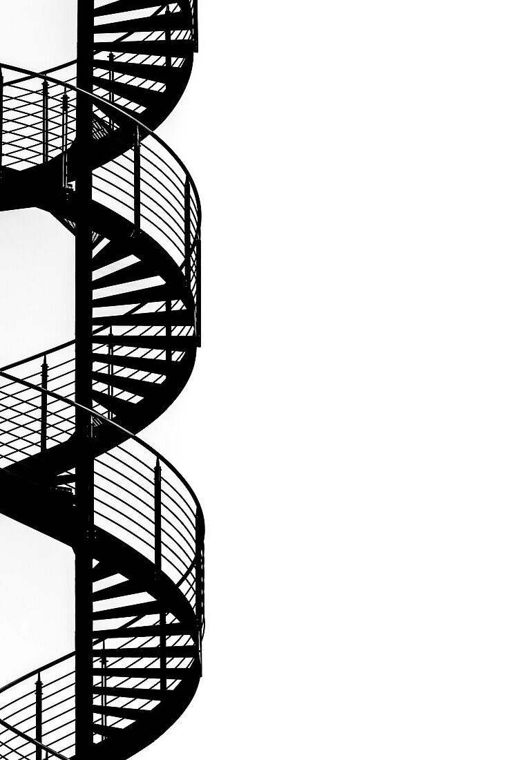 A spiral staircase as a silhouette, modern architecture in the harbour city, Hamburg, Germany