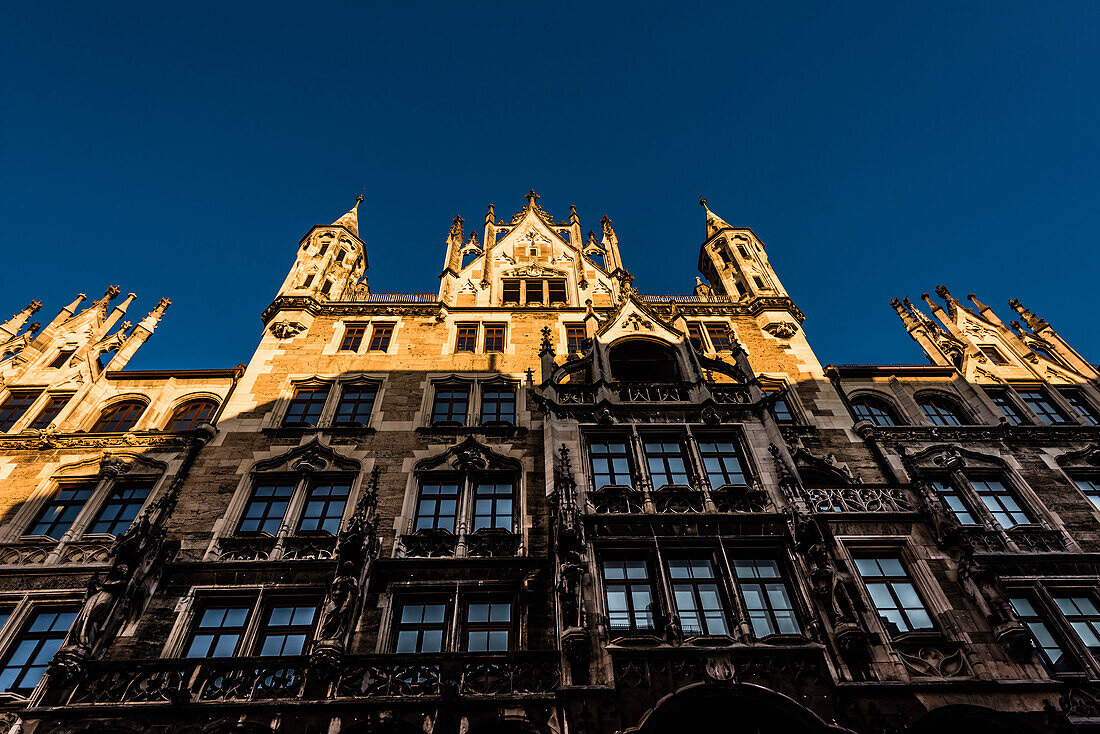 Side view city hall at Marienplatz in the light of the sunset, Munich, Bavaria, Germany