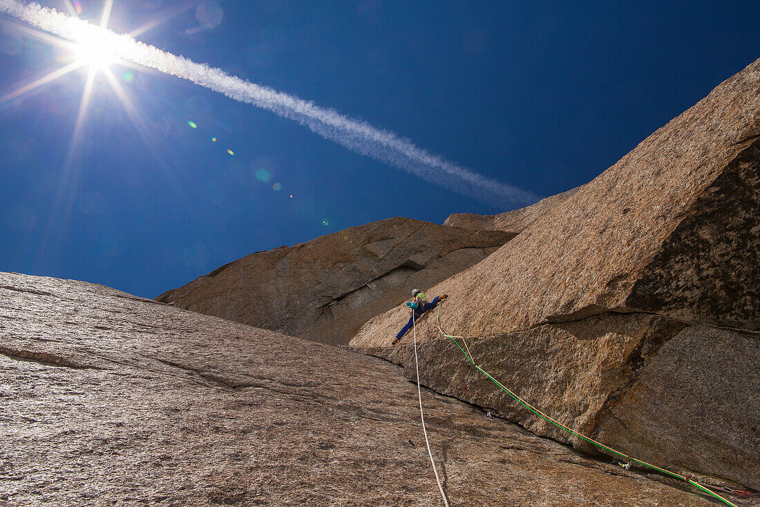 Caroline Ciavaldini, a female French climber, climbing in the Voie Petit, Grand Capucin, Mont-Blanc massif.