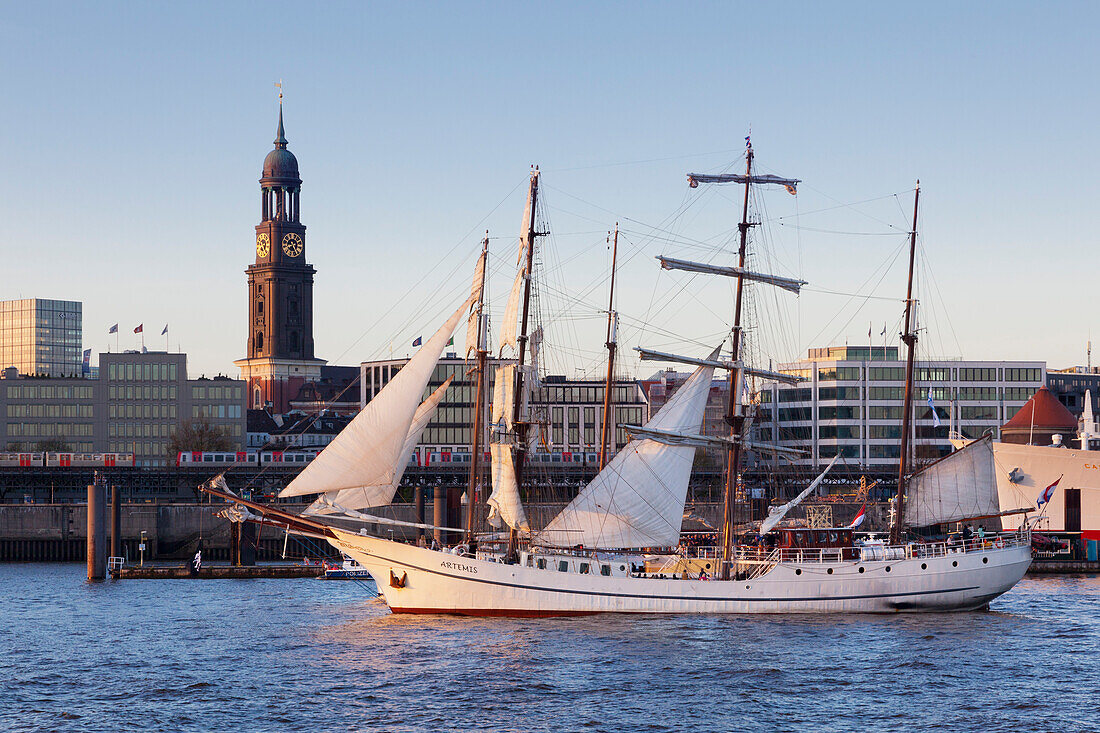 Sailing ship Artemis in front of the Michel, St Micaelis church, Hamburg, Germany