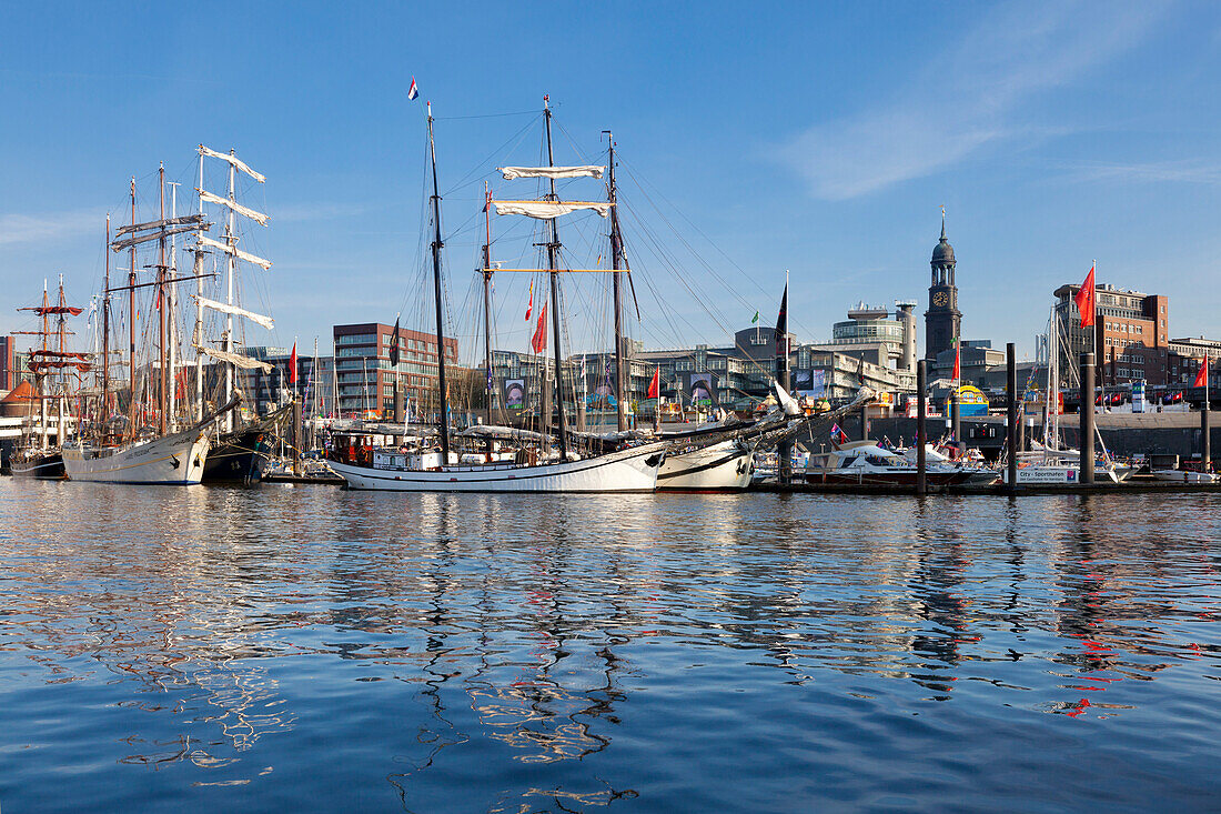 Sailing ships in the harbour in front of the Michel, St Michaelis church, Hamburg, Germany