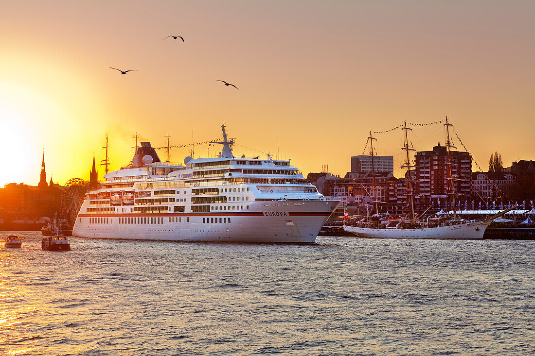 Cruise liner Europa and sailing ship Dar Mlodziezy at the harbour, Hamburg, Germany