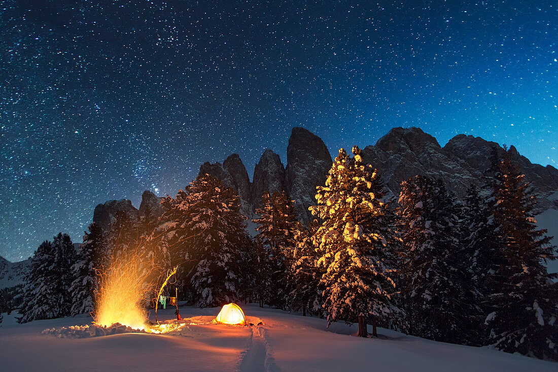 Camp area with campfire in front of the Villnoesser Geisler, Grupp delle Odle, Dolomites, Unesco world heritage, Italy