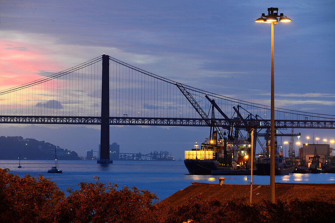 Bridge of 25th of April with harbour, Lisbon, Portugal