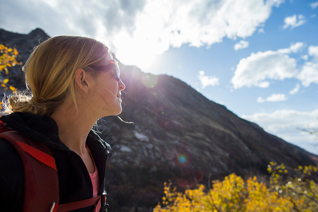 A woman enjoying a beautiful fall day in Utah.